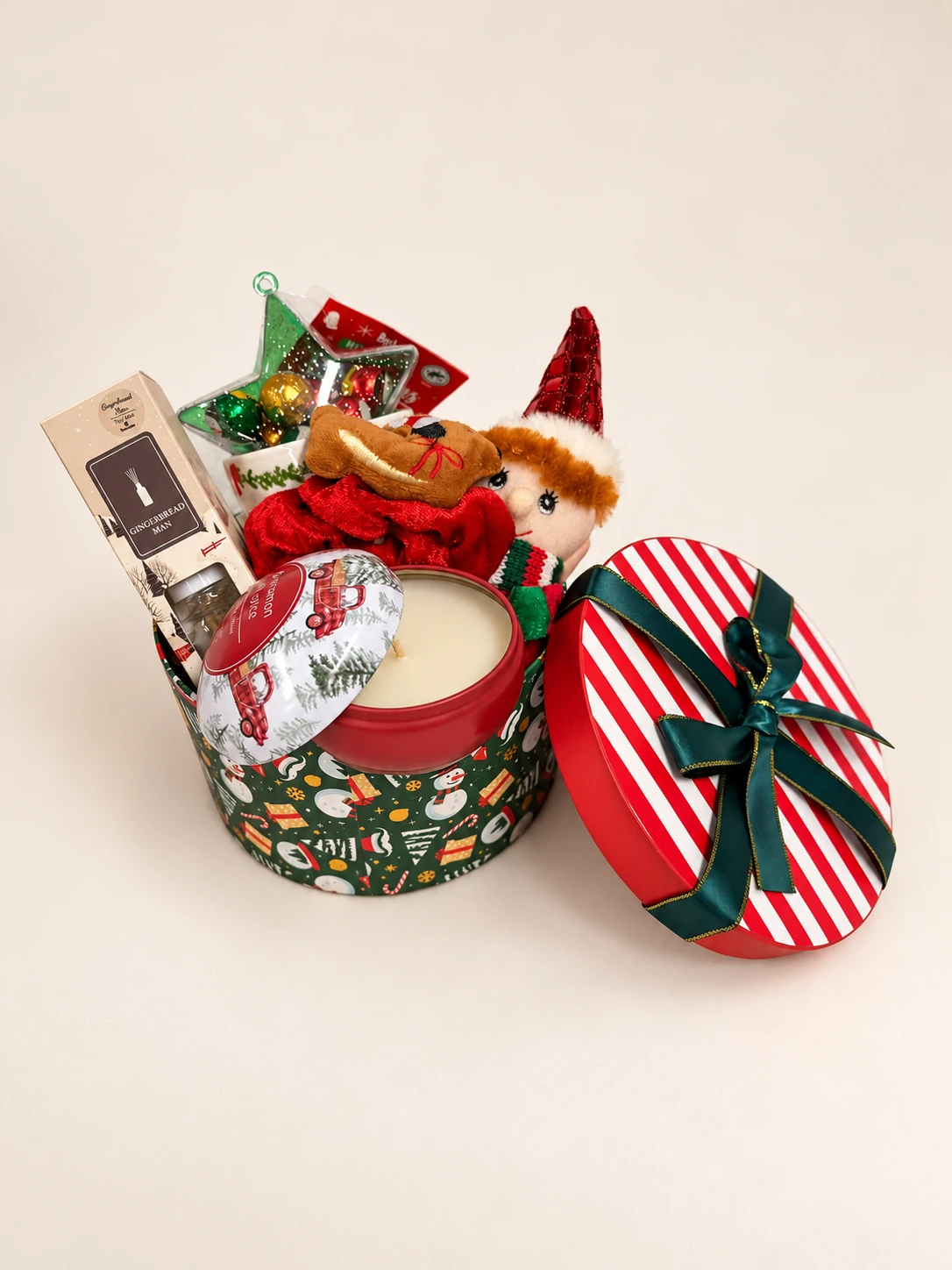 Magia di Natale: la box rotonda verde e rossa con coperchio a righe e fiocco